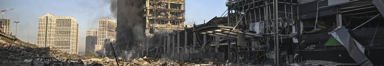 Smoke billows after a Russian attack on the Retroville shopping in Kyiv